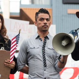 Activists in the Reno, Nev. community come together in support of immigration on the one-year anniversary of President Barack Obama's executive order called Deferred Action for Childhood Arrivals.